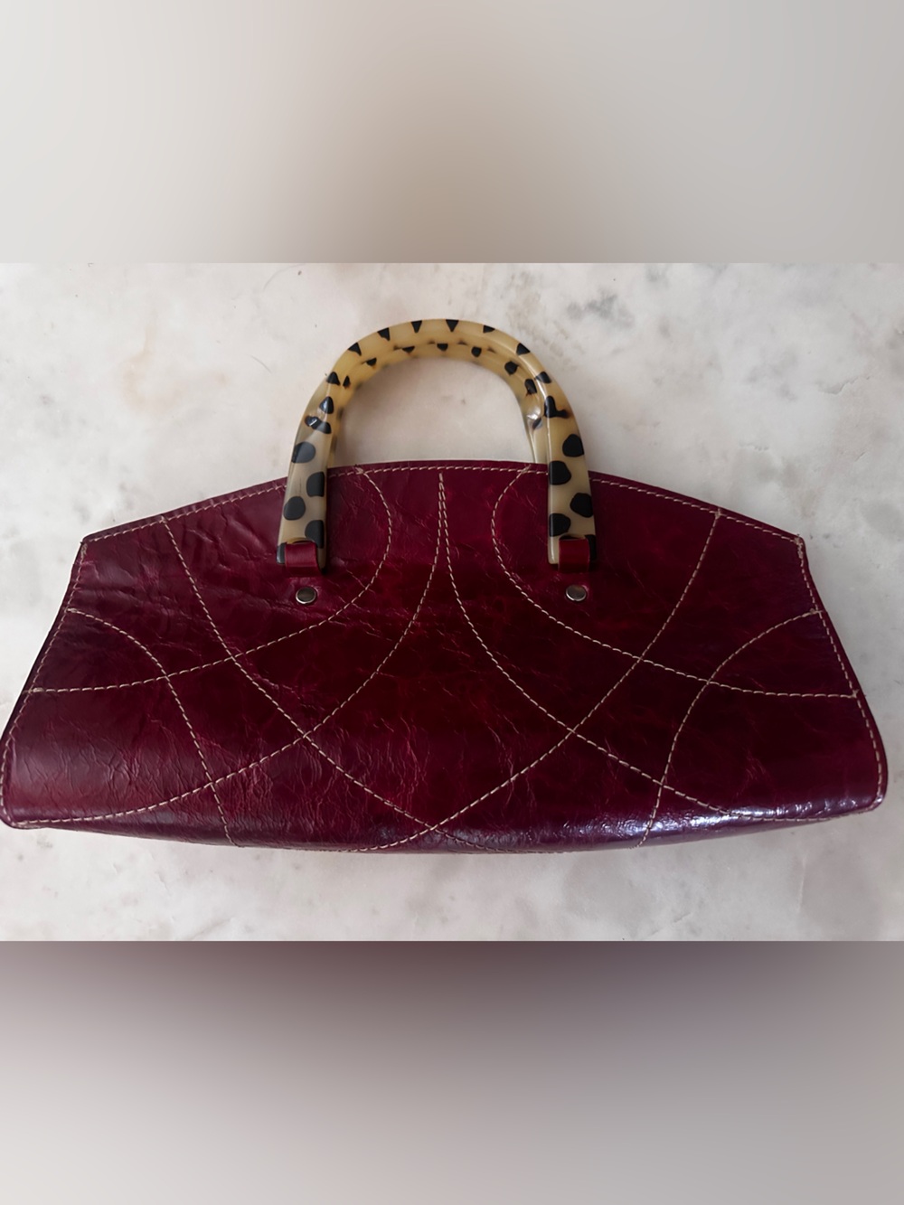 Structured Red Leather Clutch with Tortoiseshell-Style Handle